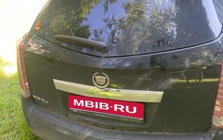 Cadillac SRX II рестайлинг, 2011 год, 750 000 рублей, 5 фотография