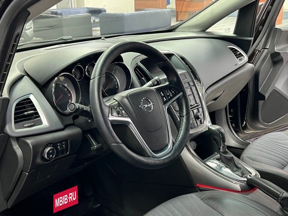 Opel Astra, 2013 год, 749 000 рублей, 9 фотография