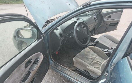 Mitsubishi Carisma I, 1997 год, 75 000 рублей, 12 фотография