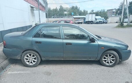 Mitsubishi Carisma I, 1997 год, 75 000 рублей, 13 фотография