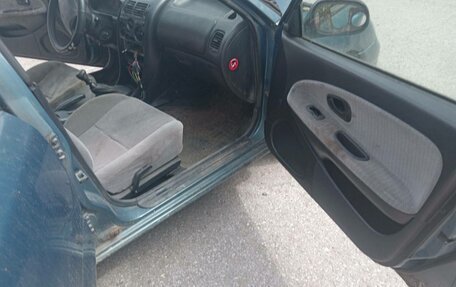Mitsubishi Carisma I, 1997 год, 75 000 рублей, 16 фотография