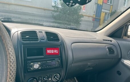 Mazda 323, 1998 год, 59 000 рублей, 9 фотография