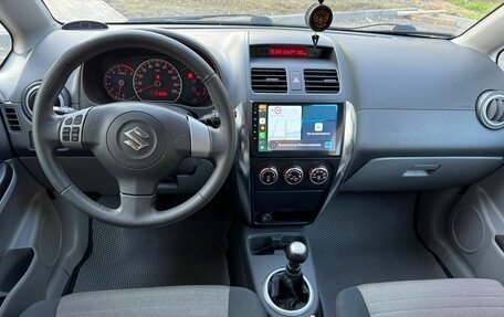 Suzuki SX4 II рестайлинг, 2009 год, 750 000 рублей, 21 фотография