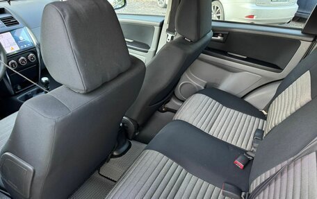 Suzuki SX4 II рестайлинг, 2009 год, 750 000 рублей, 23 фотография