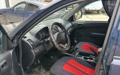 Mitsubishi L200 IV рестайлинг, 2013 год, 1 050 000 рублей, 9 фотография