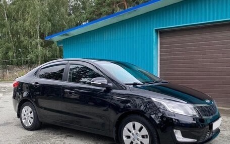 KIA Rio III рестайлинг, 2012 год, 930 000 рублей, 3 фотография