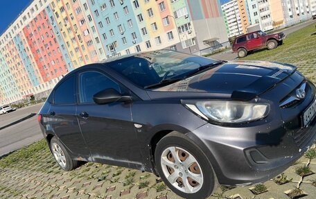 Hyundai Solaris II рестайлинг, 2011 год, 600 000 рублей, 13 фотография