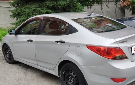 Hyundai Solaris II рестайлинг, 2011 год, 550 000 рублей, 18 фотография
