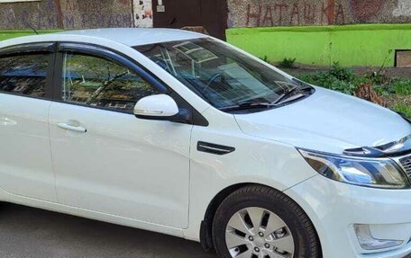 KIA Rio III рестайлинг, 2012 год, 750 000 рублей, 17 фотография