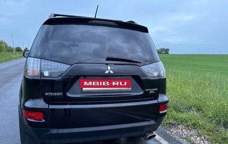 Mitsubishi Outlander III рестайлинг 3, 2011 год, 1 060 000 рублей, 13 фотография