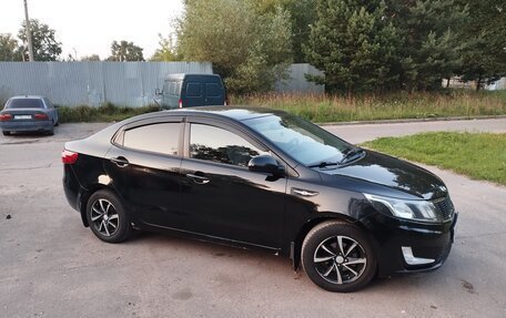 KIA Rio III рестайлинг, 2011 год, 800 000 рублей, 3 фотография