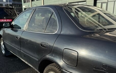 Toyota Sprinter VIII (E110), 1995 год, 300 000 рублей, 4 фотография