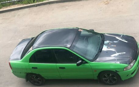 Mitsubishi Lancer VII, 1997 год, 135 000 рублей, 3 фотография