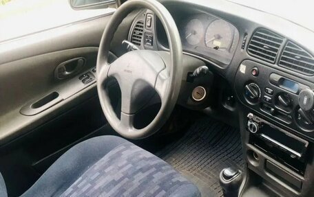 Mitsubishi Lancer VII, 1997 год, 135 000 рублей, 7 фотография