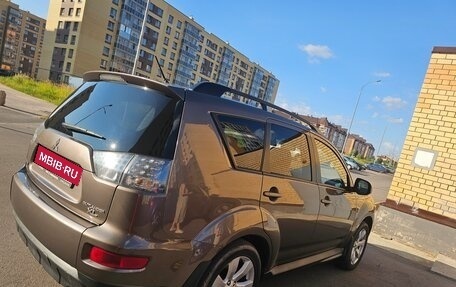 Mitsubishi Outlander III рестайлинг 3, 2011 год, 1 050 000 рублей, 4 фотография