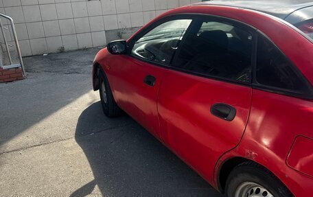 Mazda 323, 1998 год, 105 000 рублей, 8 фотография