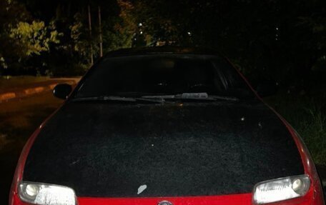 Mazda 323, 1998 год, 105 000 рублей, 17 фотография