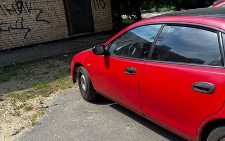 Mazda 323, 1998 год, 105 000 рублей, 22 фотография
