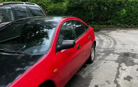 Mazda 323, 1998 год, 105 000 рублей, 37 фотография