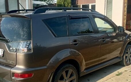 Mitsubishi Outlander III рестайлинг 3, 2010 год, 950 000 рублей, 2 фотография