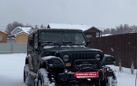 Jeep Wrangler, 2002 год, 1 390 000 рублей, 38 фотография