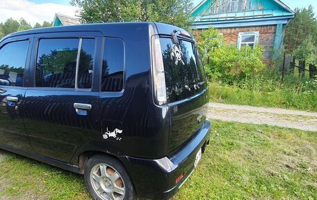 Nissan Cube II, 1998 год, 300 000 рублей, 12 фотография