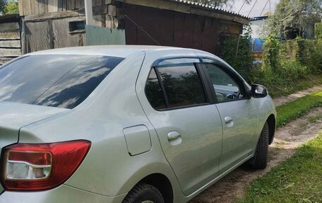 Renault Logan II, 2014 год, 900 000 рублей, 3 фотография