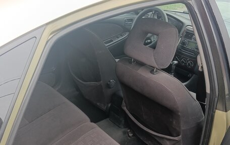 Toyota Avensis III рестайлинг, 2001 год, 300 000 рублей, 15 фотография