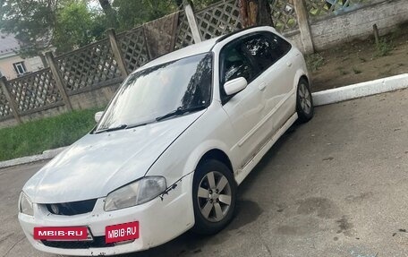 Mazda Familia Y10, 1999 год, 280 000 рублей, 9 фотография
