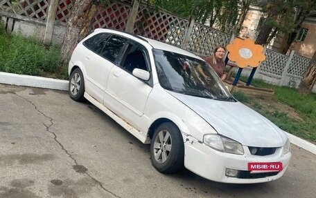 Mazda Familia Y10, 1999 год, 280 000 рублей, 10 фотография