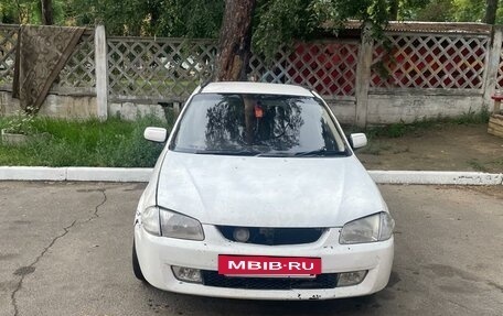 Mazda Familia Y10, 1999 год, 280 000 рублей, 11 фотография