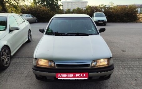Nissan Primera II рестайлинг, 1992 год, 335 000 рублей, 2 фотография