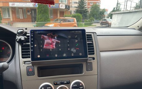 Nissan Tiida, 2008 год, 650 000 рублей, 27 фотография
