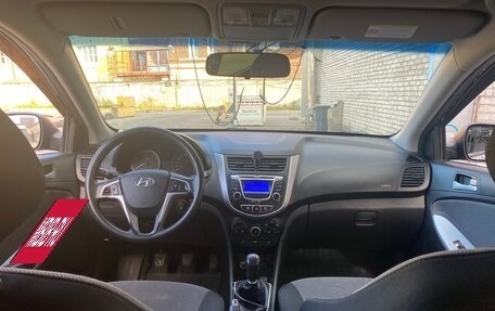 Hyundai Solaris II рестайлинг, 2011 год, 650 000 рублей, 11 фотография