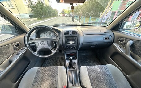 Mazda 323, 1998 год, 140 000 рублей, 4 фотография