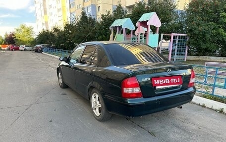 Mazda 323, 1998 год, 140 000 рублей, 11 фотография
