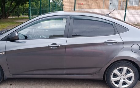 Hyundai Solaris II рестайлинг, 2011 год, 890 000 рублей, 19 фотография