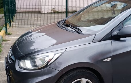 Hyundai Solaris II рестайлинг, 2011 год, 890 000 рублей, 21 фотография