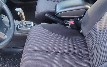 Nissan Tiida, 2010 год, 760 000 рублей, 8 фотография