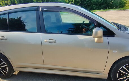 Nissan Tiida, 2010 год, 760 000 рублей, 12 фотография