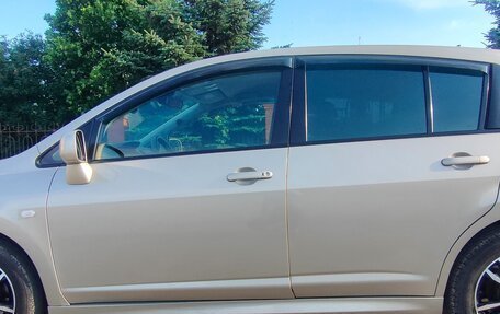 Nissan Tiida, 2010 год, 760 000 рублей, 14 фотография