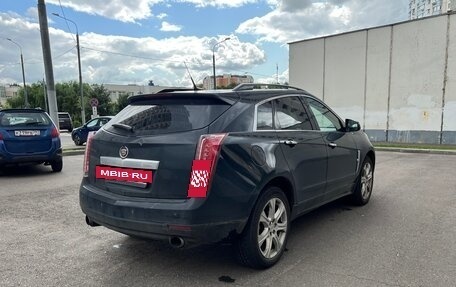 Cadillac SRX II рестайлинг, 2010 год, 800 000 рублей, 3 фотография