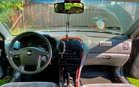 KIA Magentis I, 2004 год, 300 000 рублей, 12 фотография