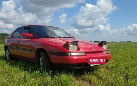 Mazda 323, 1992 год, 575 000 рублей, 4 фотография