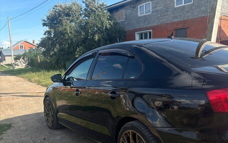 Volkswagen Jetta VI, 2011 год, 800 000 рублей, 2 фотография