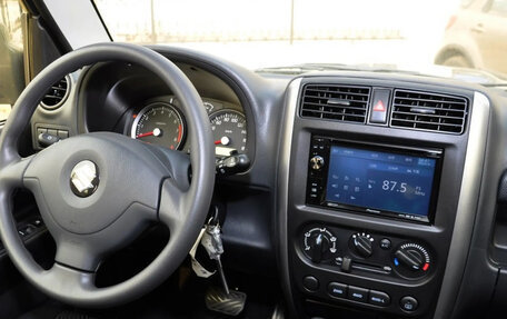 Suzuki Jimny, 2012 год, 750 000 рублей, 18 фотография