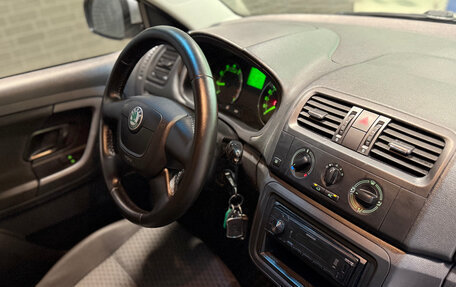 Skoda Fabia II, 2011 год, 600 000 рублей, 9 фотография