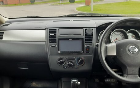 Nissan Tiida, 2010 год, 715 000 рублей, 8 фотография