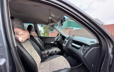 KIA Sportage II, 2009 год, 900 000 рублей, 17 фотография