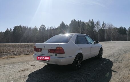 Toyota Sprinter VIII (E110), 1997 год, 300 000 рублей, 2 фотография